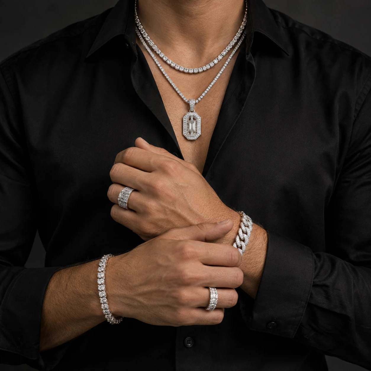 Bold diamond rings and Cuban bracelet styled with a black shirt